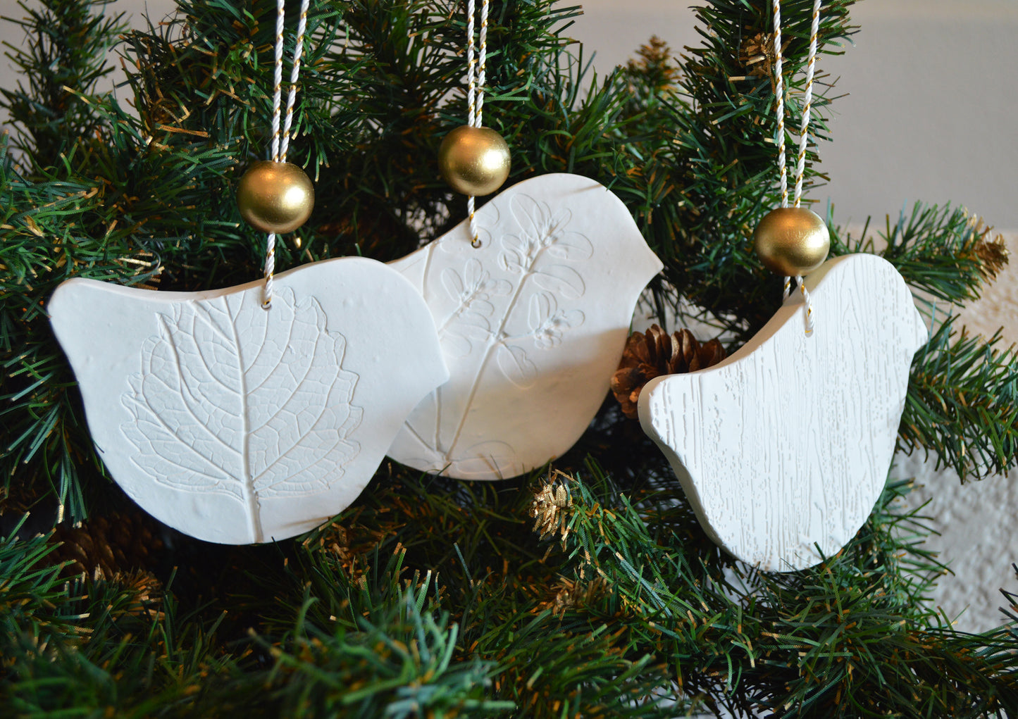 3 pure white bird shaped ornaments