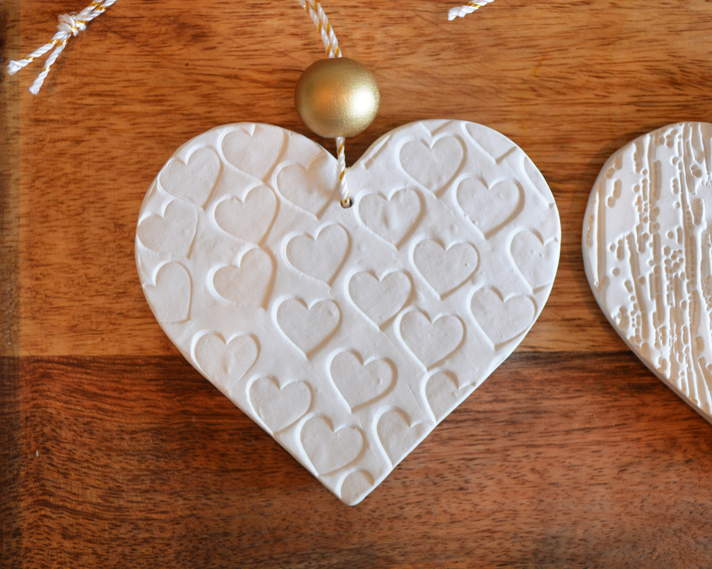 3 pure white heart shaped ornaments