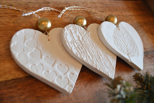 3 pure white heart shaped ornaments
