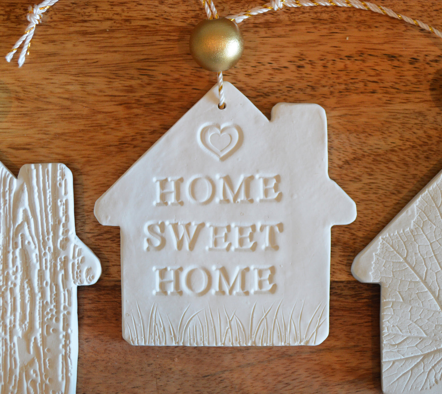 4 pure white house shaped ornaments