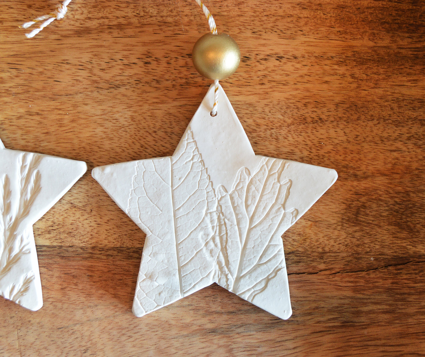 3 pure white star shaped ornaments