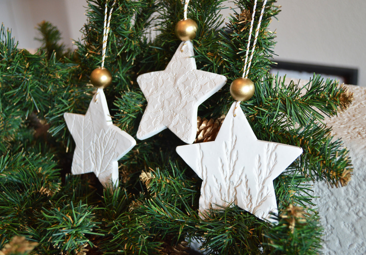 3 pure white star shaped ornaments